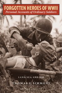 A US Navy corpsman gives a drink of water to an injured Marine, during the Battle of Guam, August 1944. (Photo by FPG/Hulton Archive/Getty Images)